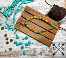 Load image into Gallery viewer, Adjustable Wood Bead on Suede Cord Bracelet Keychain with Gold Accents/Mom Gift/Christmas Gift/Turquoise/Brown/Boho Style